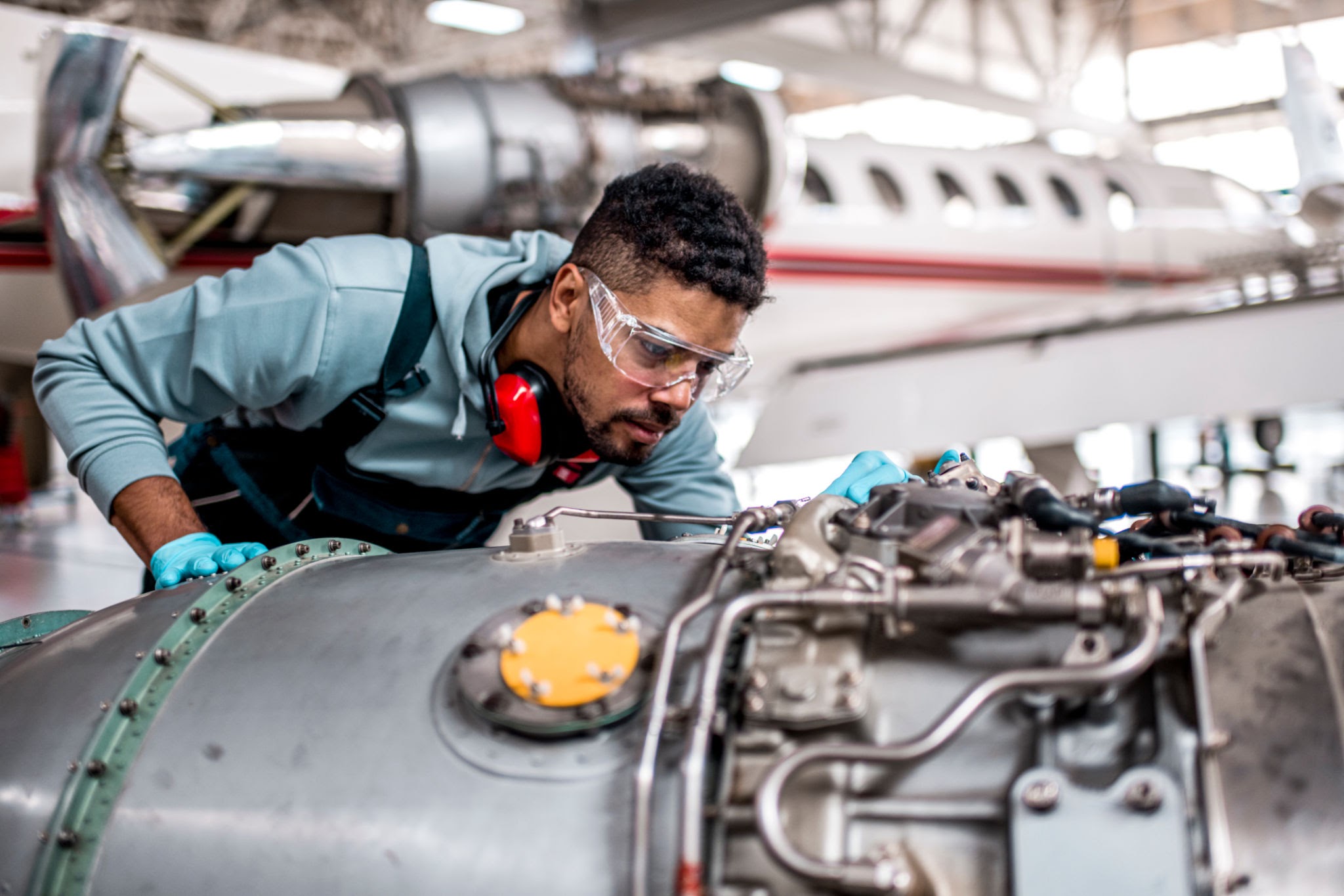Jet engine maintenance and inspection in hangar, AI generated