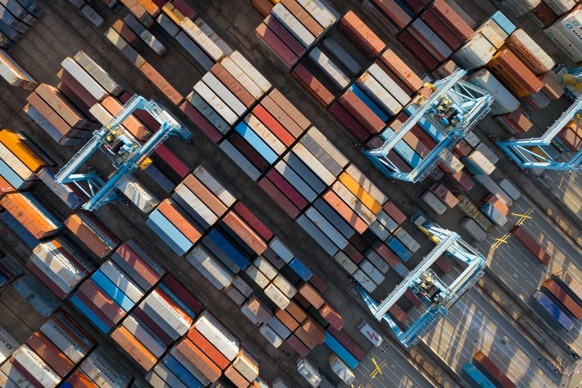 Intermodal port rail transfer terminal and maritime logistics congestion clearing
